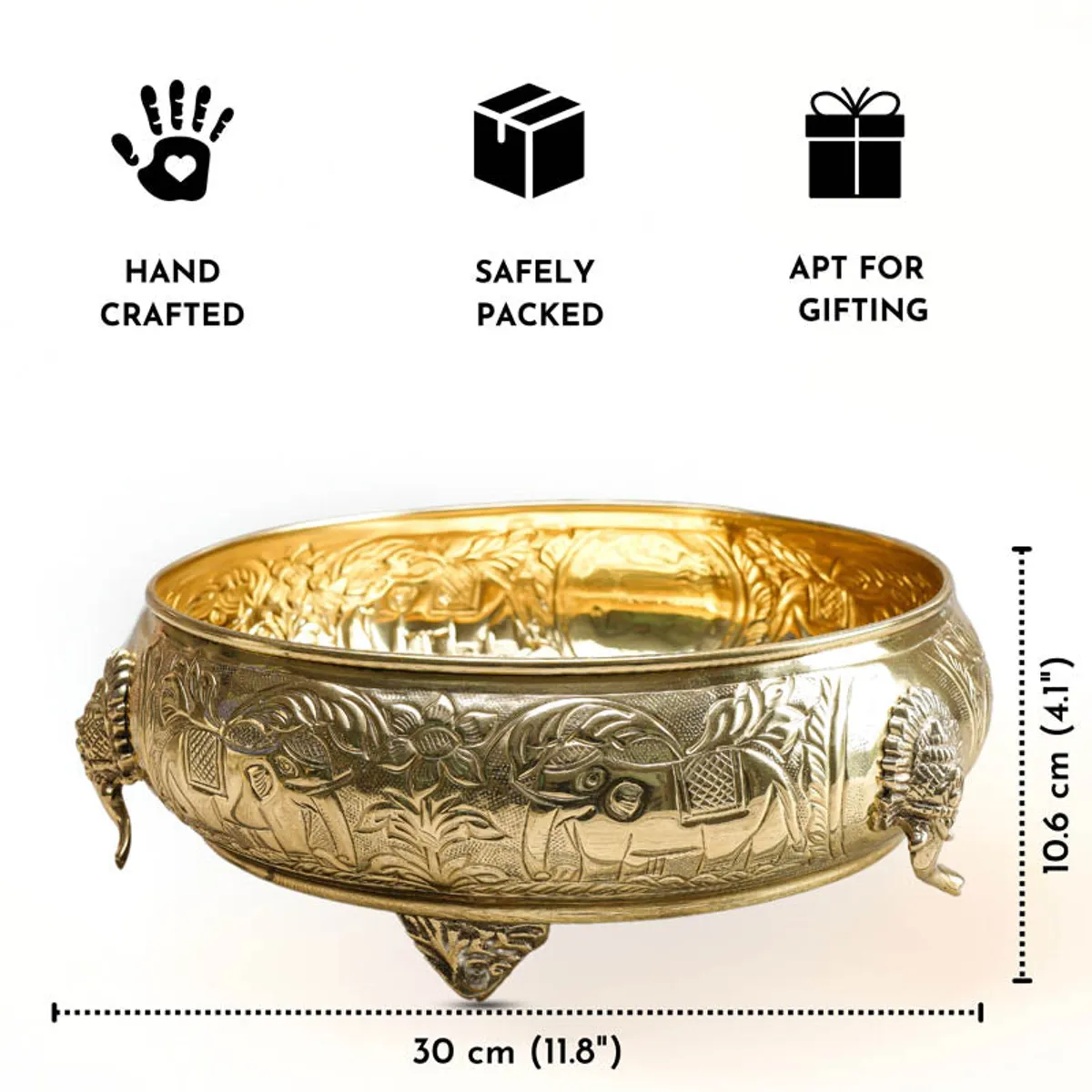 Gold brass urli shown from the side with its decorative detailing and feet.