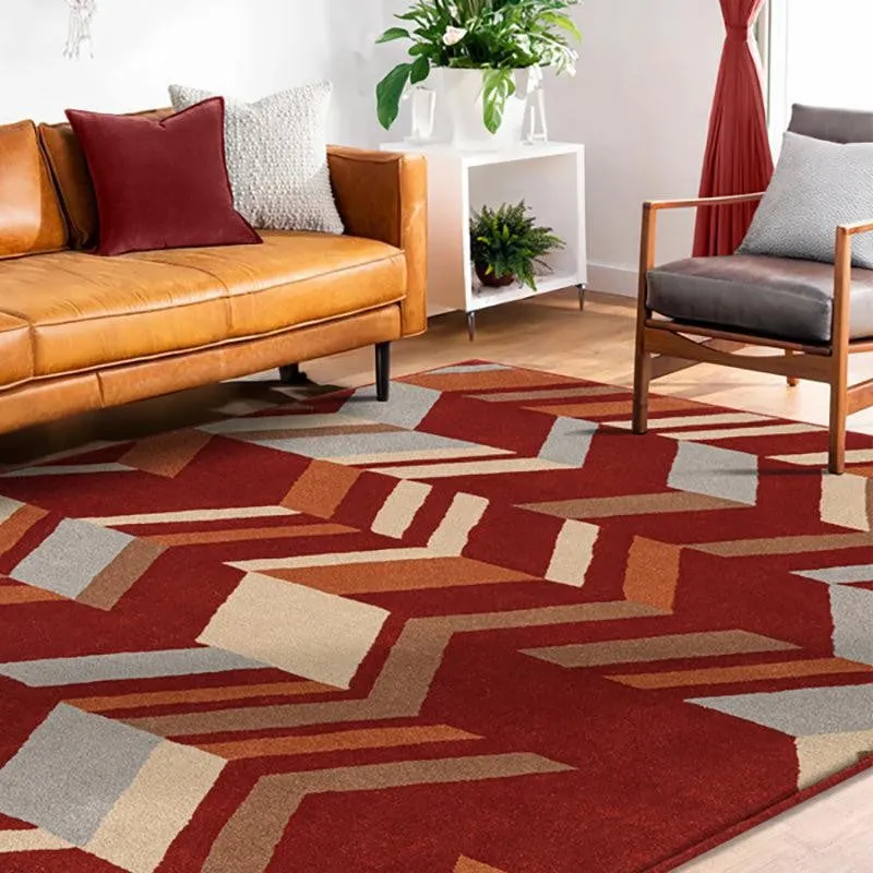 Maroon geometric carpet placed in a living room seating area