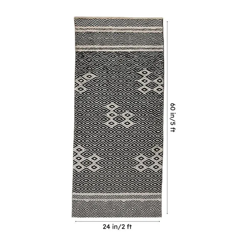 Black and off-white runner rug with dimension markers