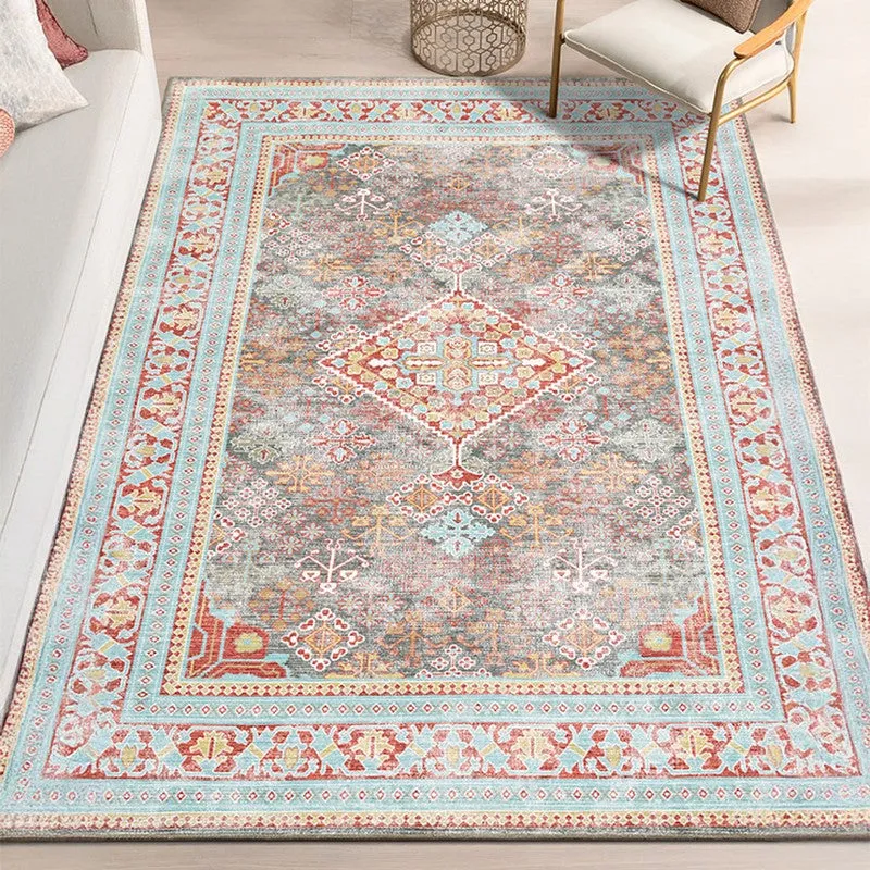 Large rectangular ethnic-style carpet in blue, red and grey placed in a living room