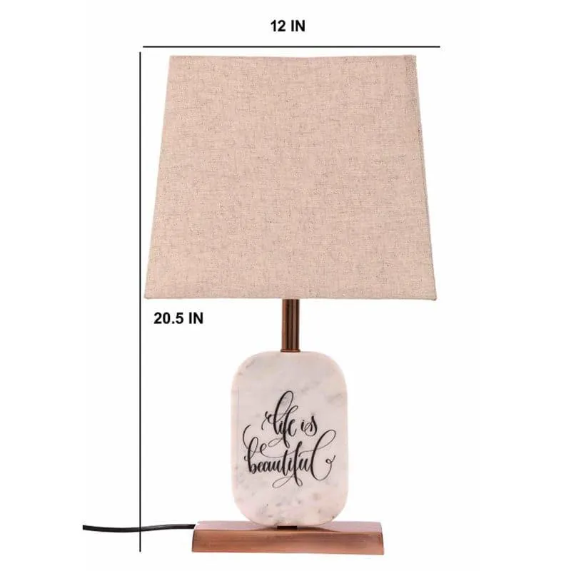 Beige fabric table lamp with white marble base and copper-toned stand