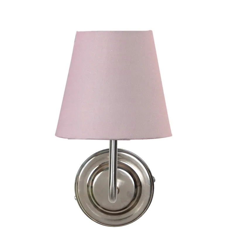 Front view of dusty pink wall lamp with tapered shade
