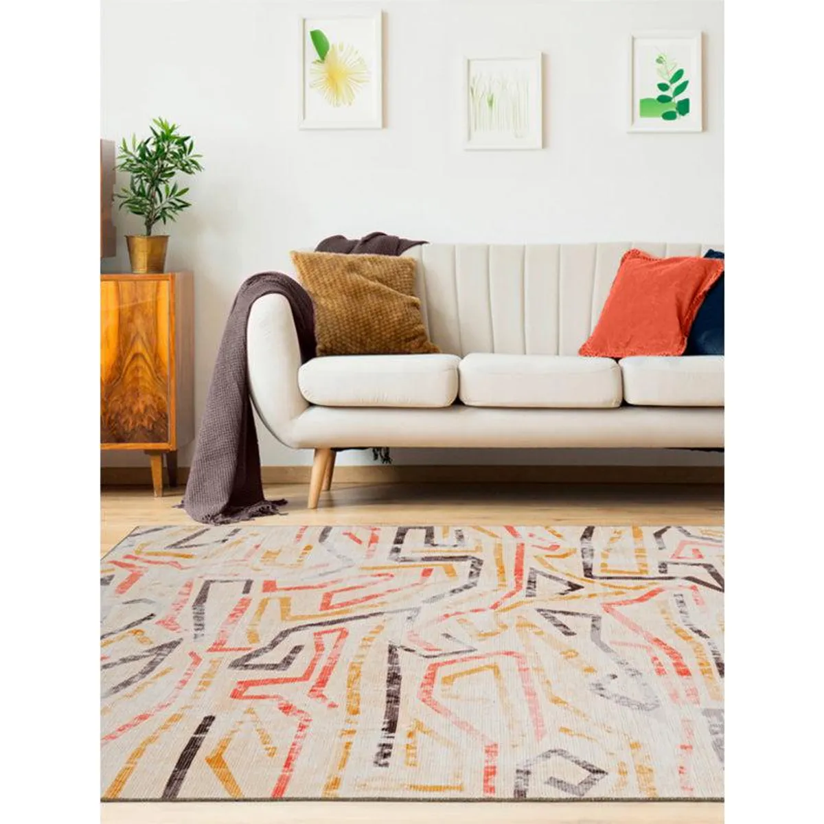 Abstract multicolour rectangular carpet placed in a living room setting