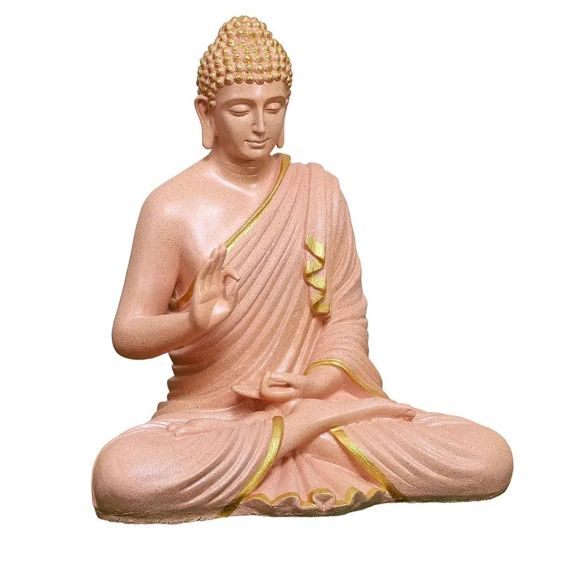 Three-quarter view of a peach Buddha marble idol with gold-toned accents