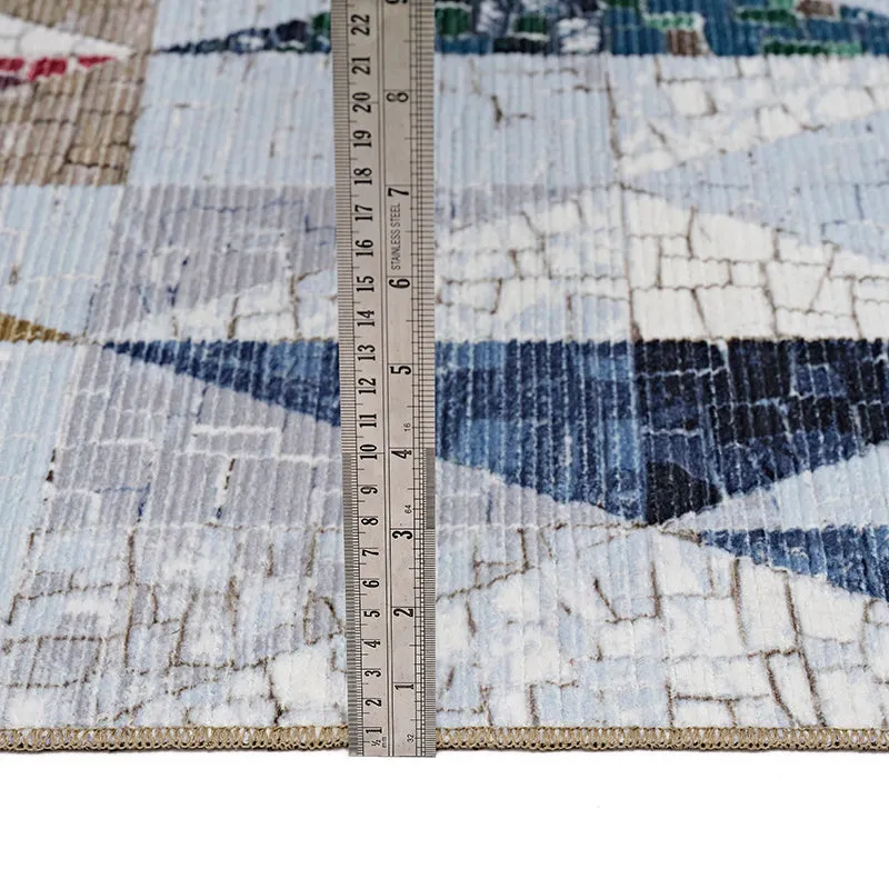 Close-up of a rug surface with a ruler placed vertically on it