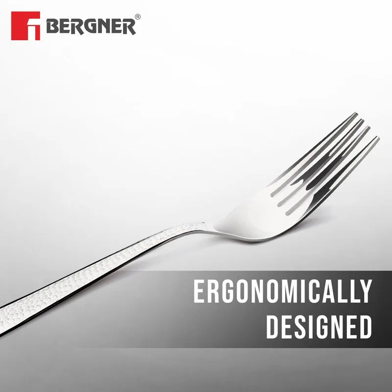 Close-up of a silver fork showing its ergonomic curved handle