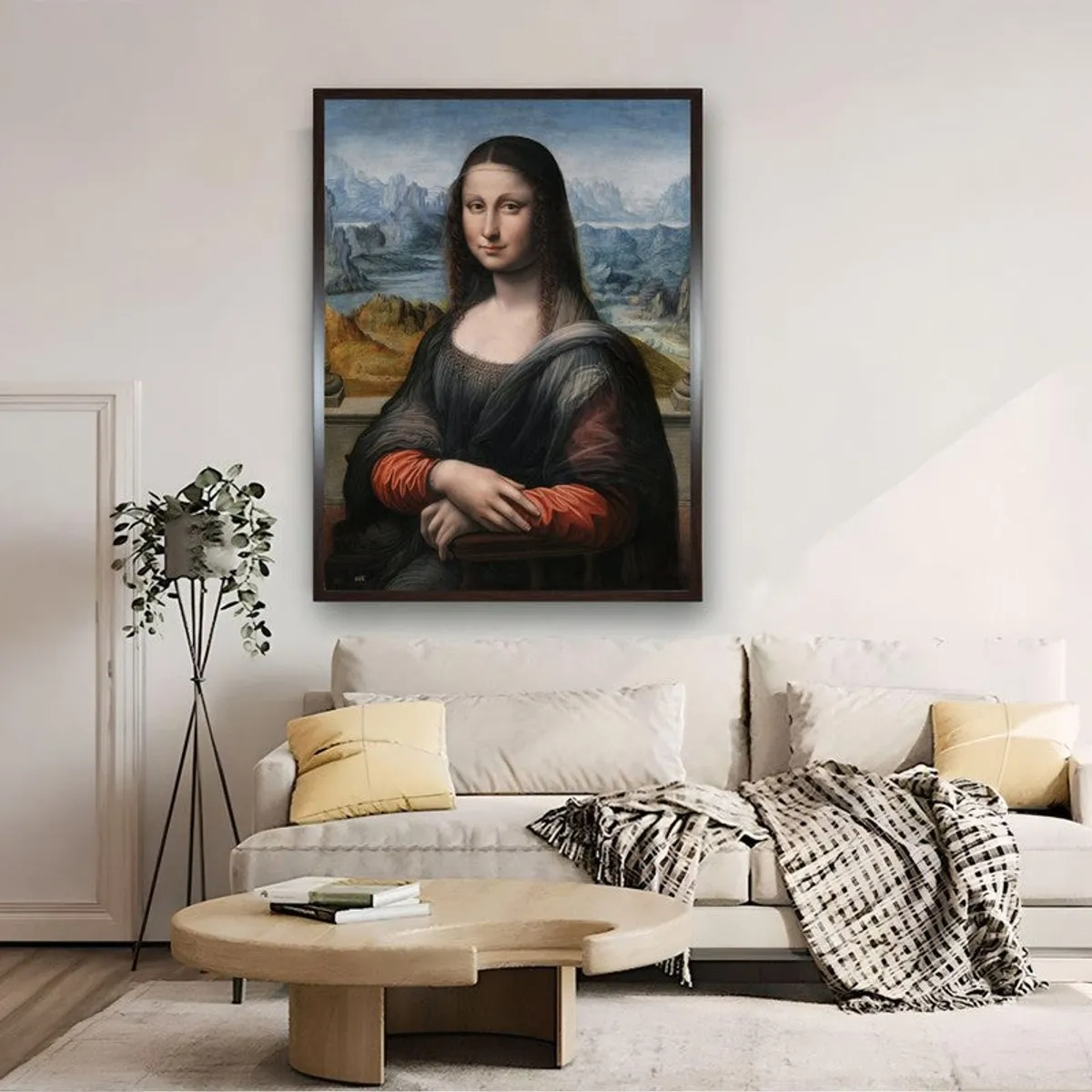 Framed Mona Lisa canvas painting displayed above a sofa in a living room