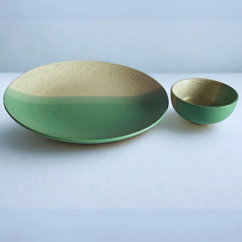 Green and beige dual-tone ceramic plate and bowl shown side by side