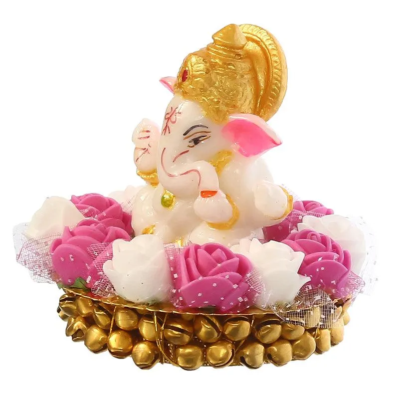 Side view of white and pink Lord Ganesha tealight holder