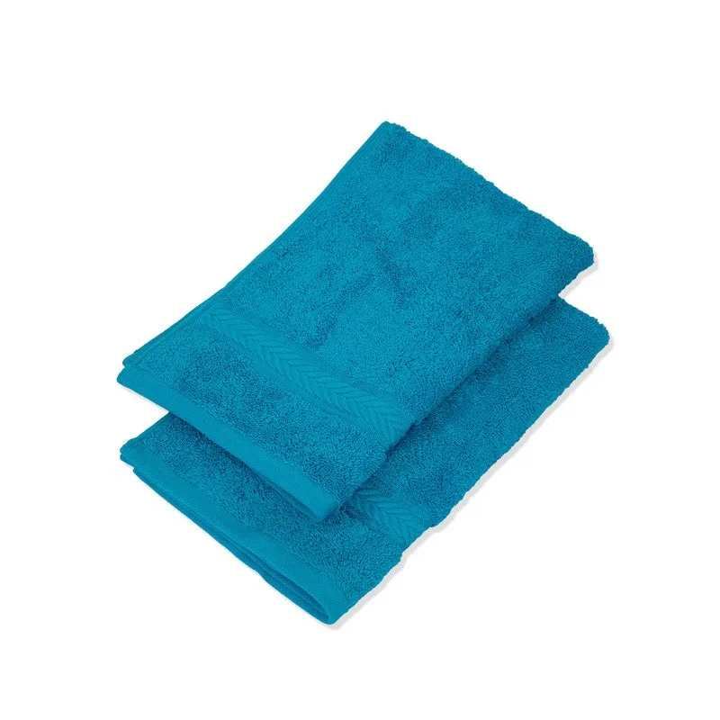 Stacked blue hand towels with woven border on a white background
