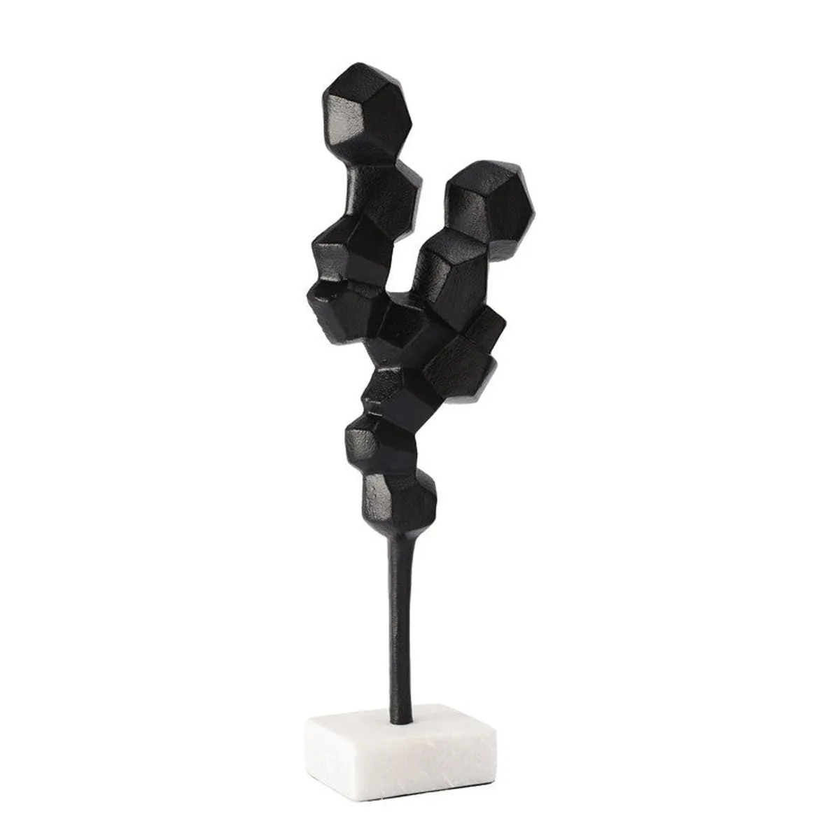 Angled view of a black geometric showpiece with a white base