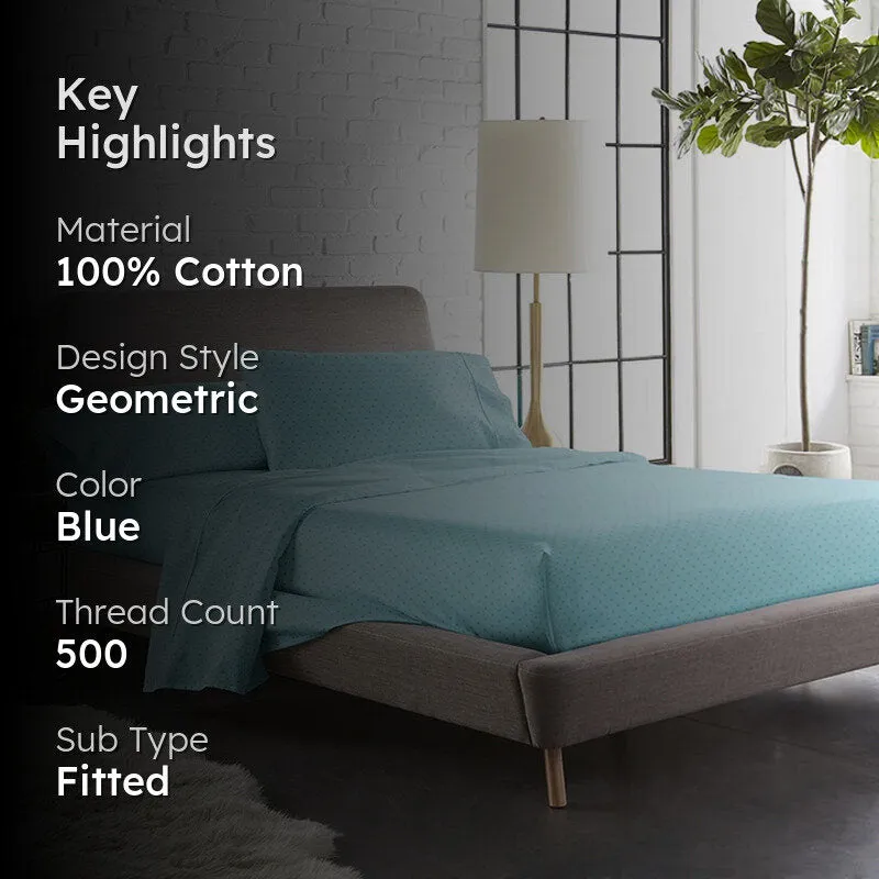 Sky-blue fitted bedsheet styled on a bed in a contemporary bedroom
