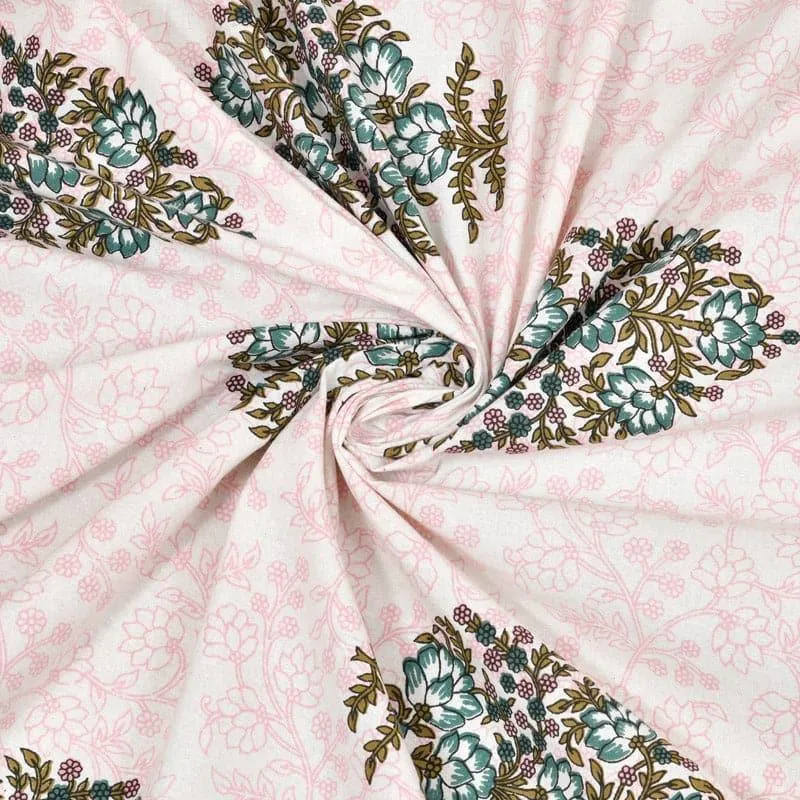Close-up of printed cotton fabric showing floral pattern and drape