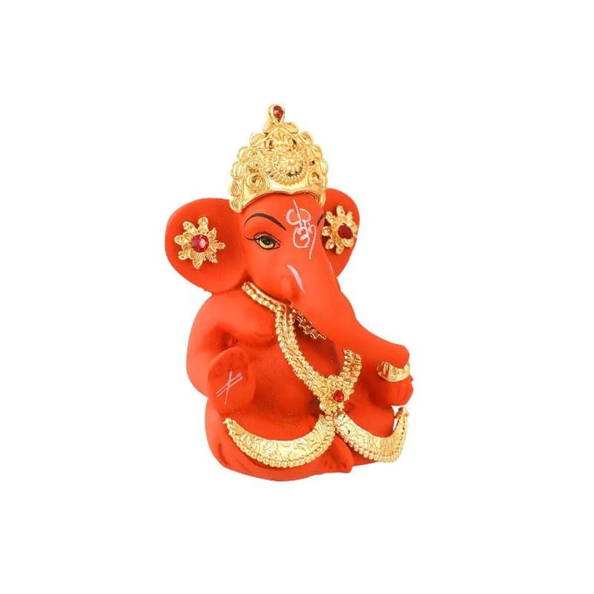 Angled view of red Ganapati idol with ornate gold crown