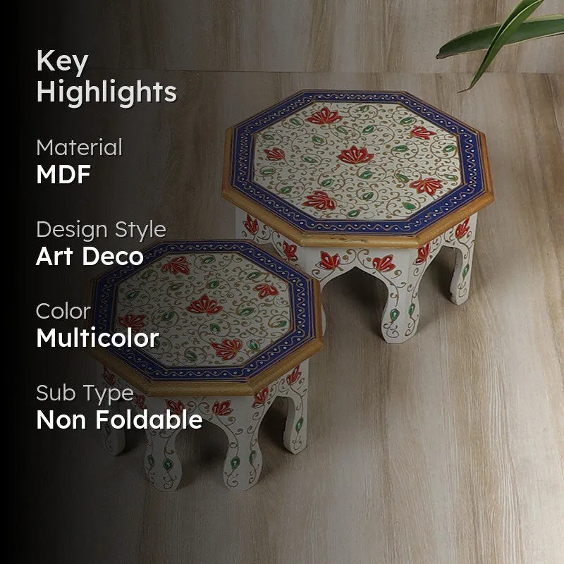 Two ornate multicolour stools with blue-trimmed floral tops