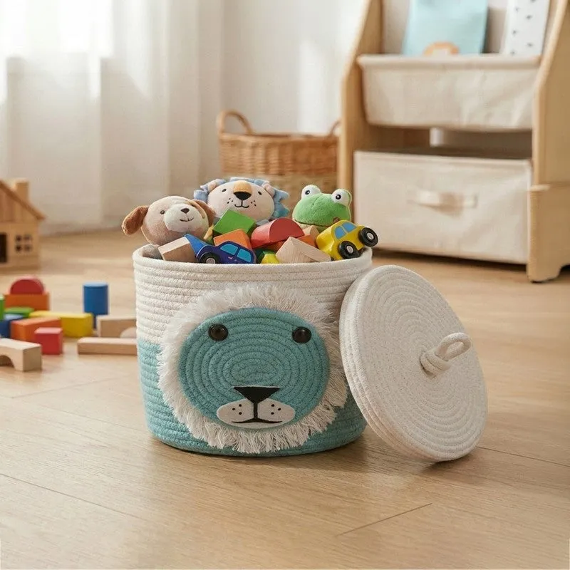 Blue and white lion-face storage basket with lid on a kids' room floor