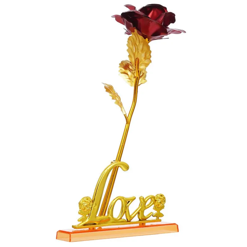 Gold decorative rose with red bloom on a clear orange base