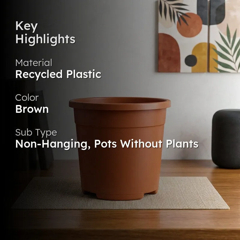 Brown plastic plant pot in a styled indoor setting