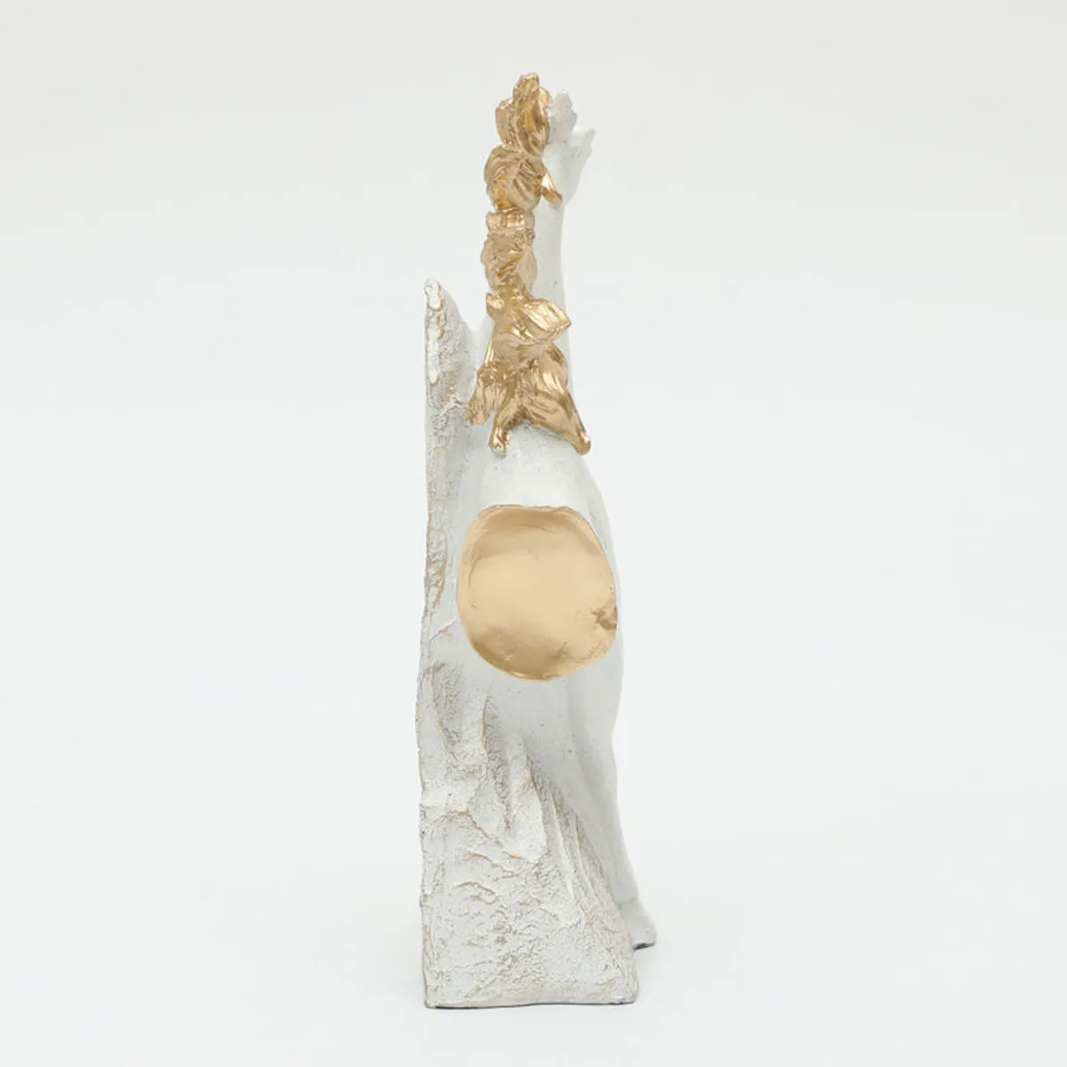 Side view of the white horse showpiece showing gold accent details