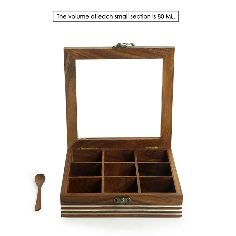 Open square wooden spice box with nine empty compartments and spoon