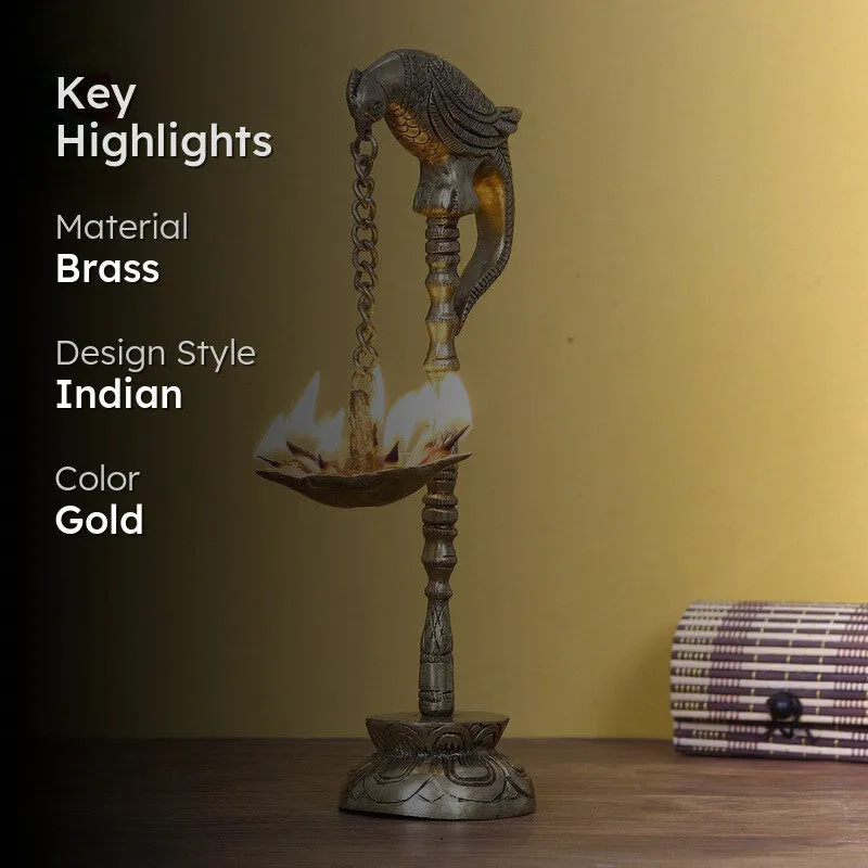 Lifestyle view of the brass parrot perch diya with its key highlights displayed.
