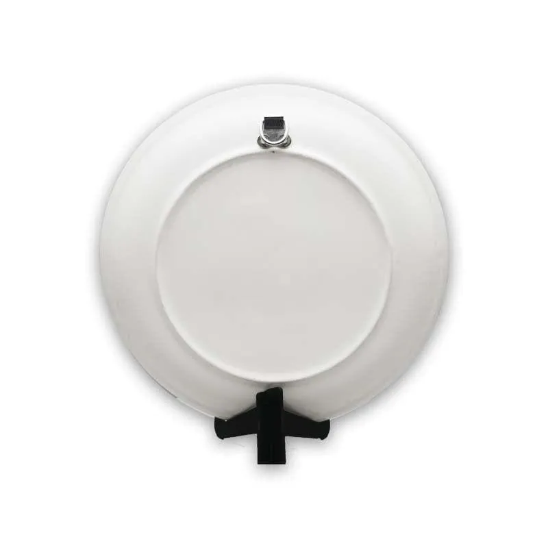 Back of a white round plate with wall hook and black display stand