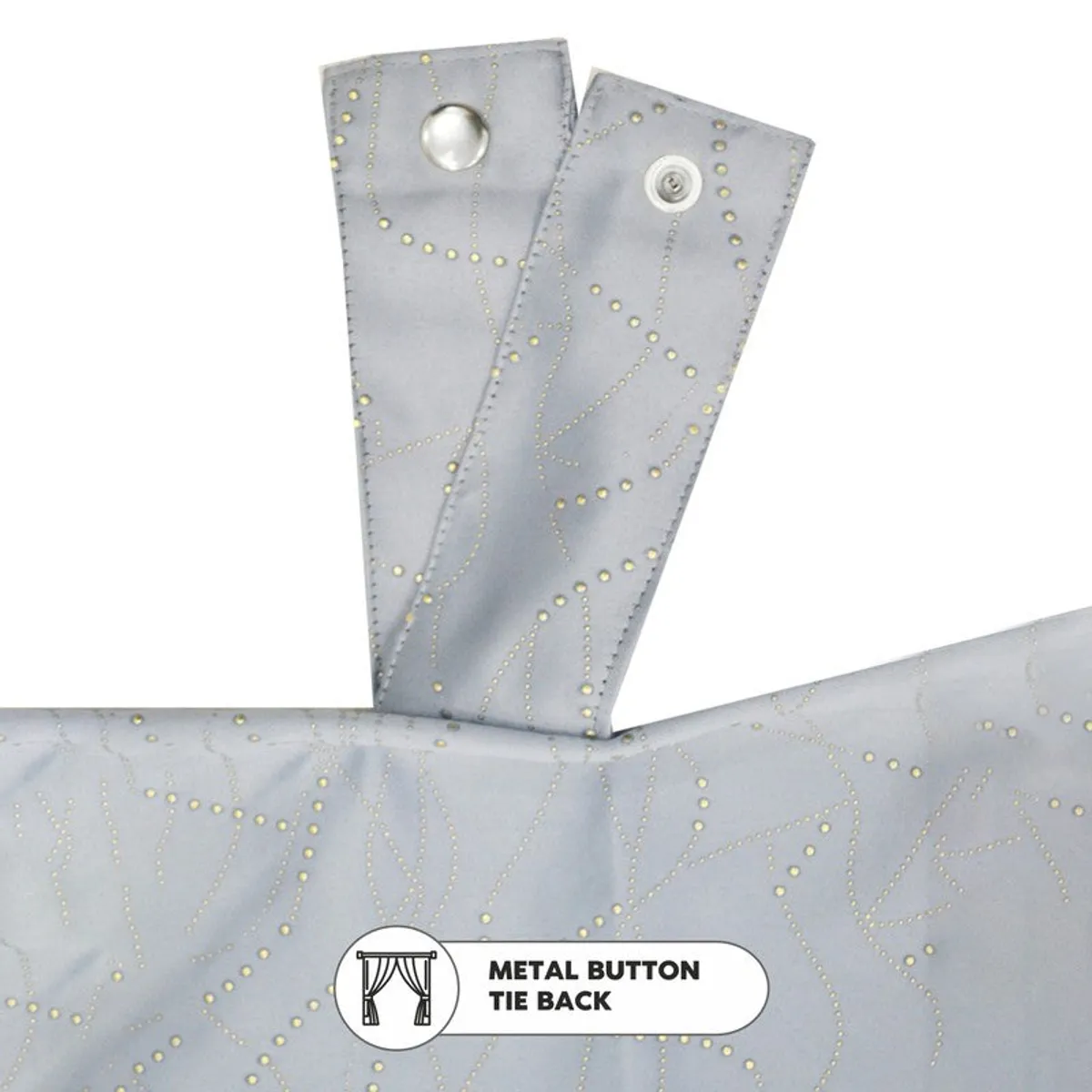 Close-up of grey curtain fabric with gold detailing and tie-back straps