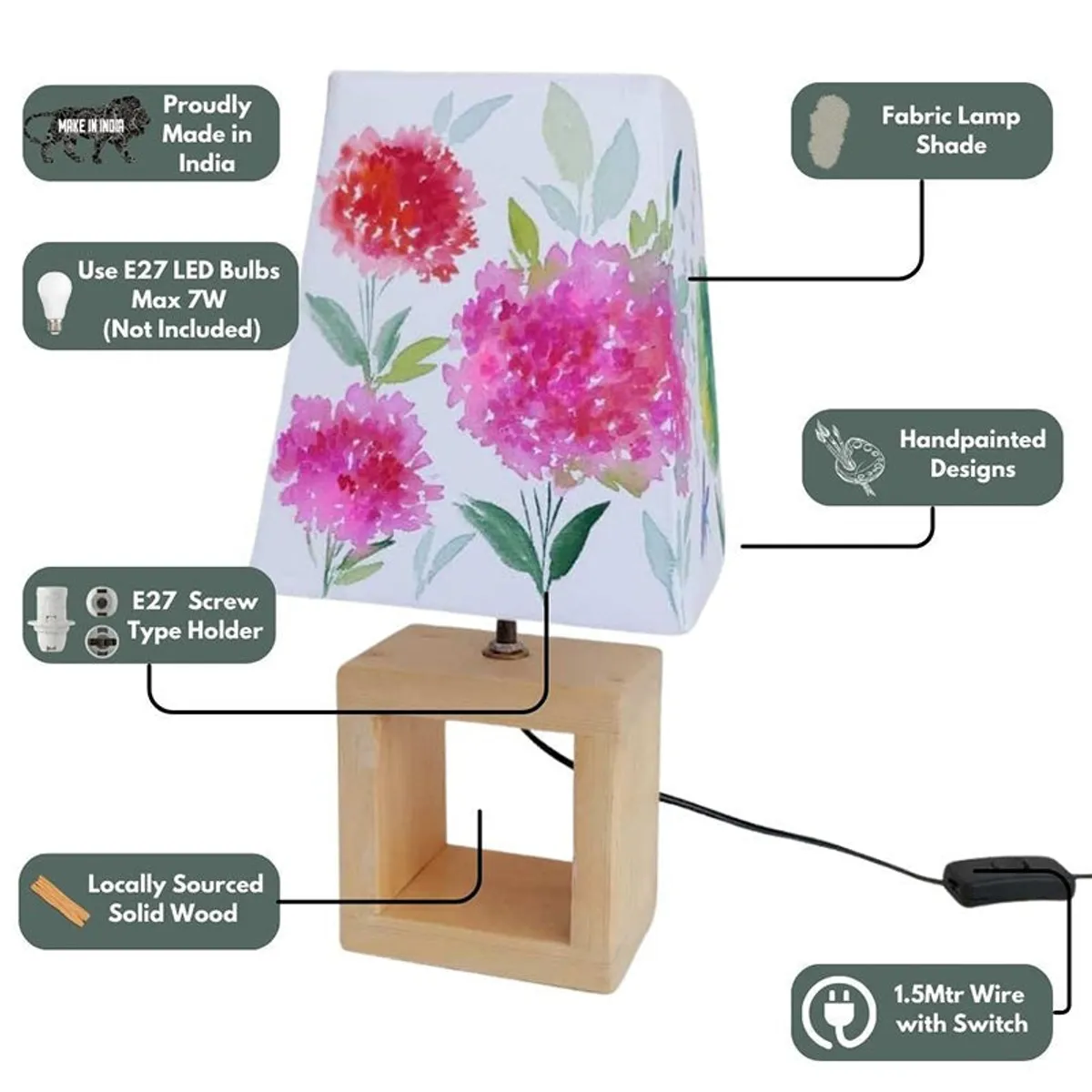 Floral fabric table lamp with wooden base and corded switch shown against white background