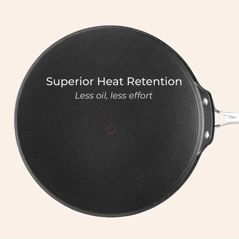 Top view of the black textured tawa cooking surface