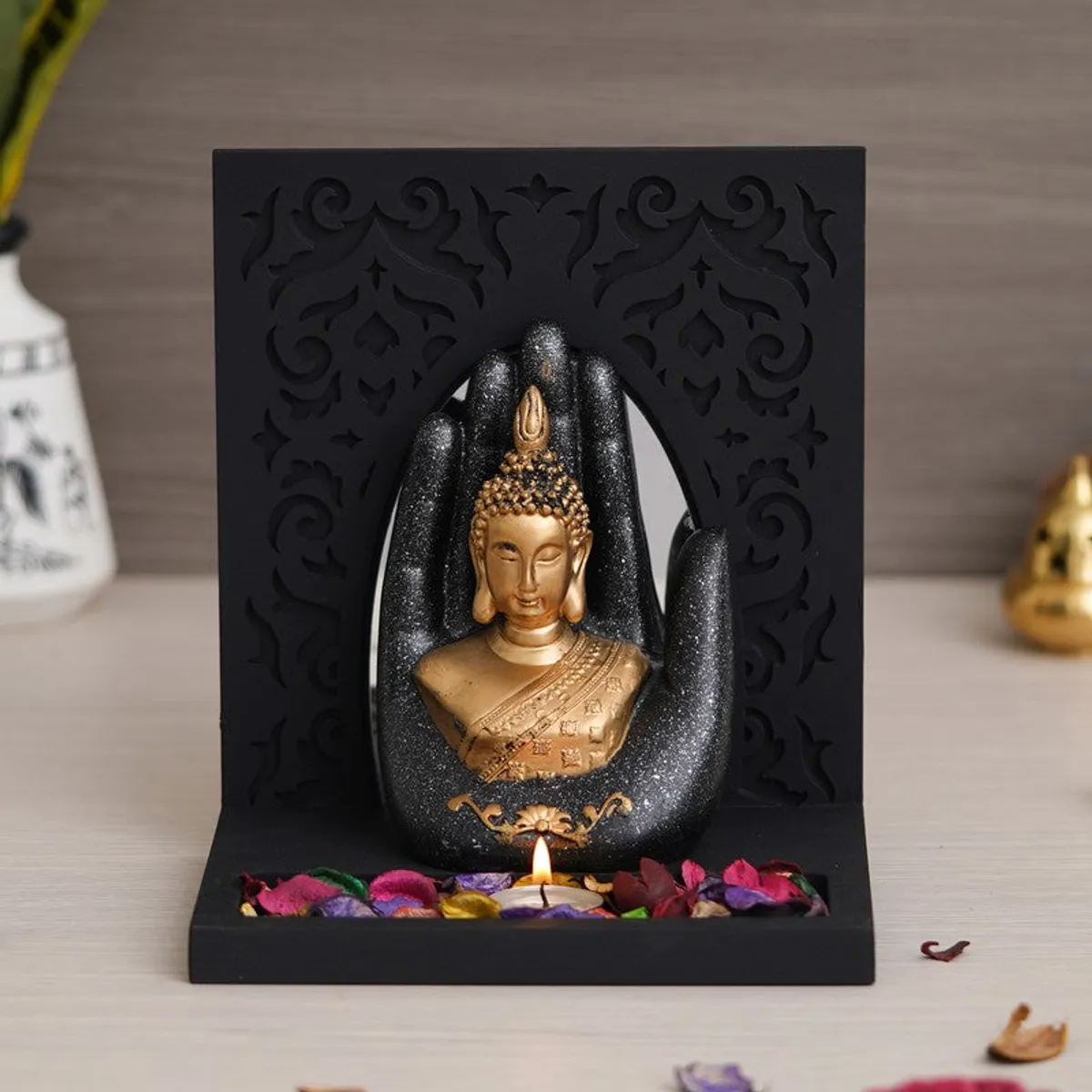 Buddha tea light holder with black carved back panel
