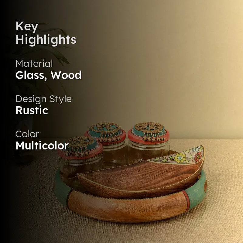 Glass jars with wooden tray and platter shown in a styled kitchen setting.