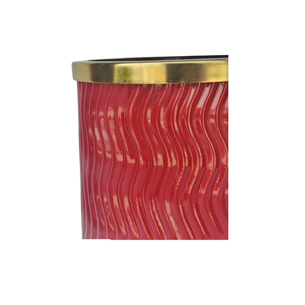 Close-up of the red wavy textured vase with a gold-toned rim