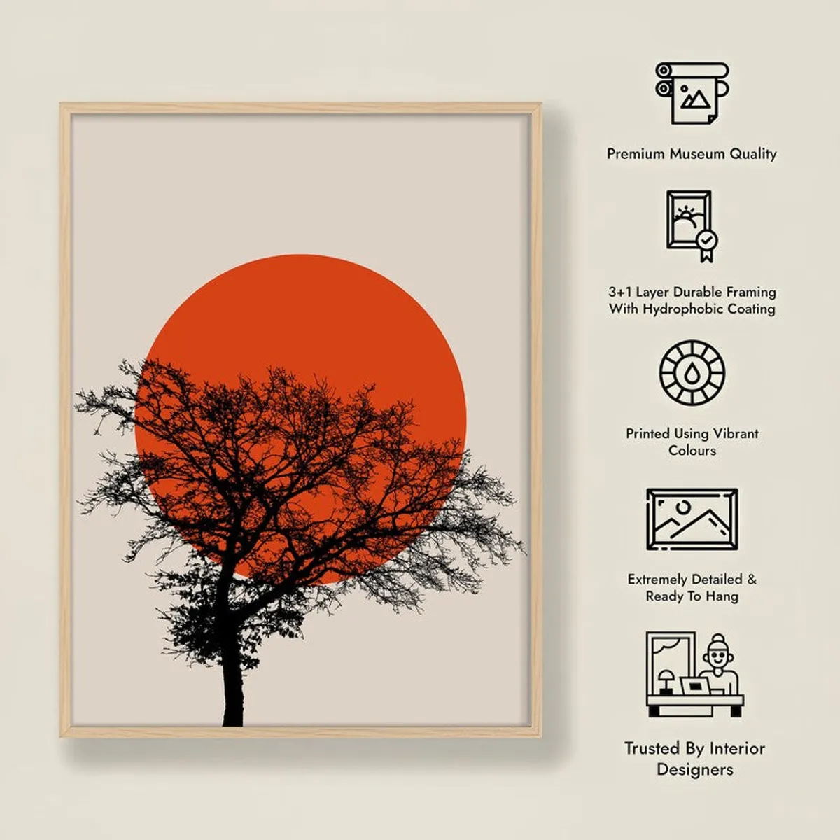 Framed tree silhouette wall art with orange sun shown beside decorative line icons