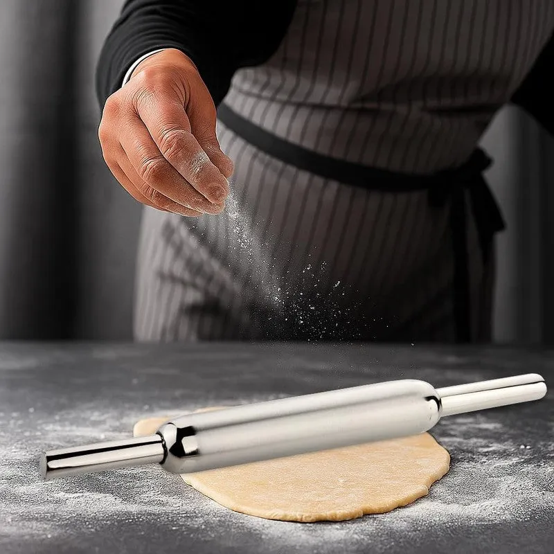 Steel rolling pin resting on rolled dough with flour being sprinkled
