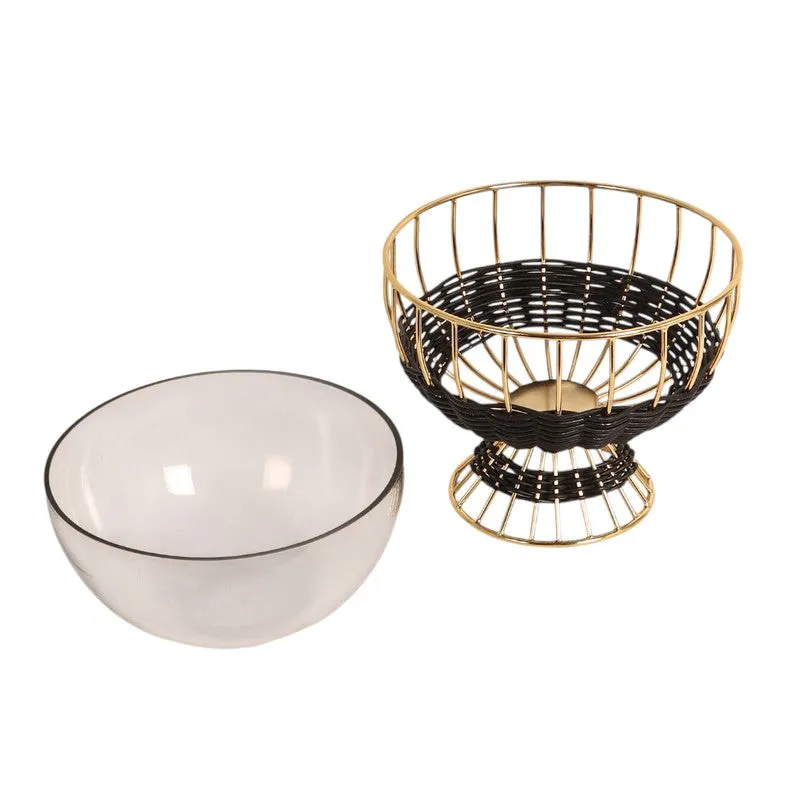 Black and gold bowl shown beside a separate clear glass bowl on a white background.