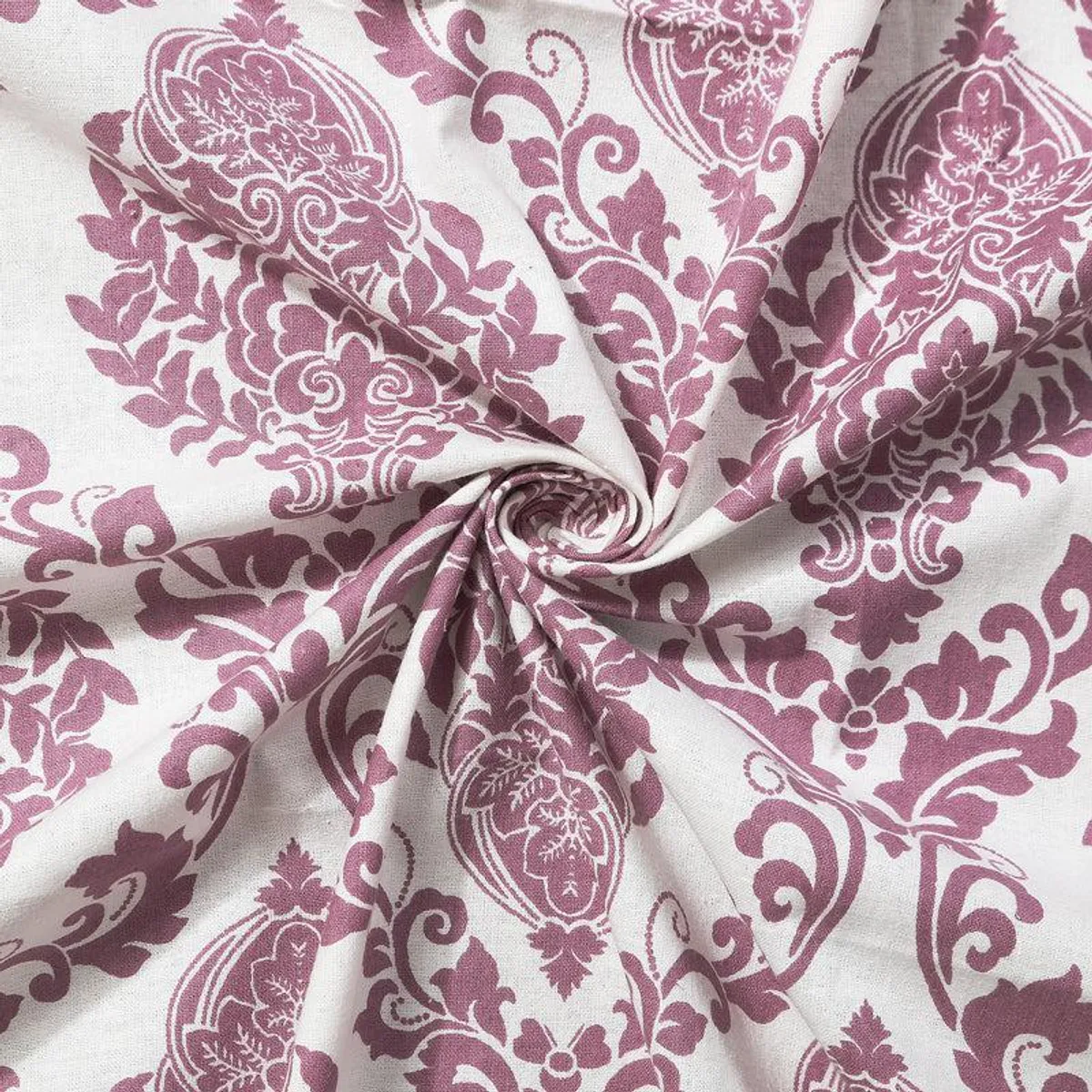 Close-up of the cotton-look fabric with purple floral damask motifs