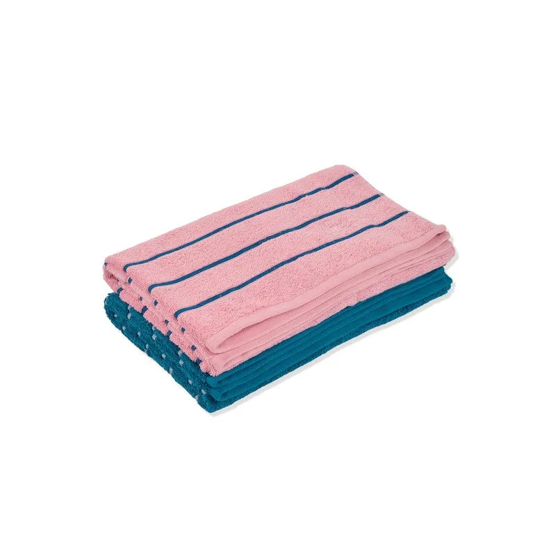 Folded pink and blue bath towels stacked on a white background