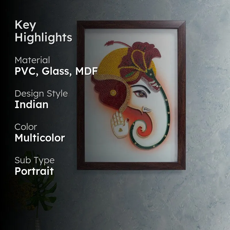 Framed Ganesha portrait displayed in a softly lit interior setting