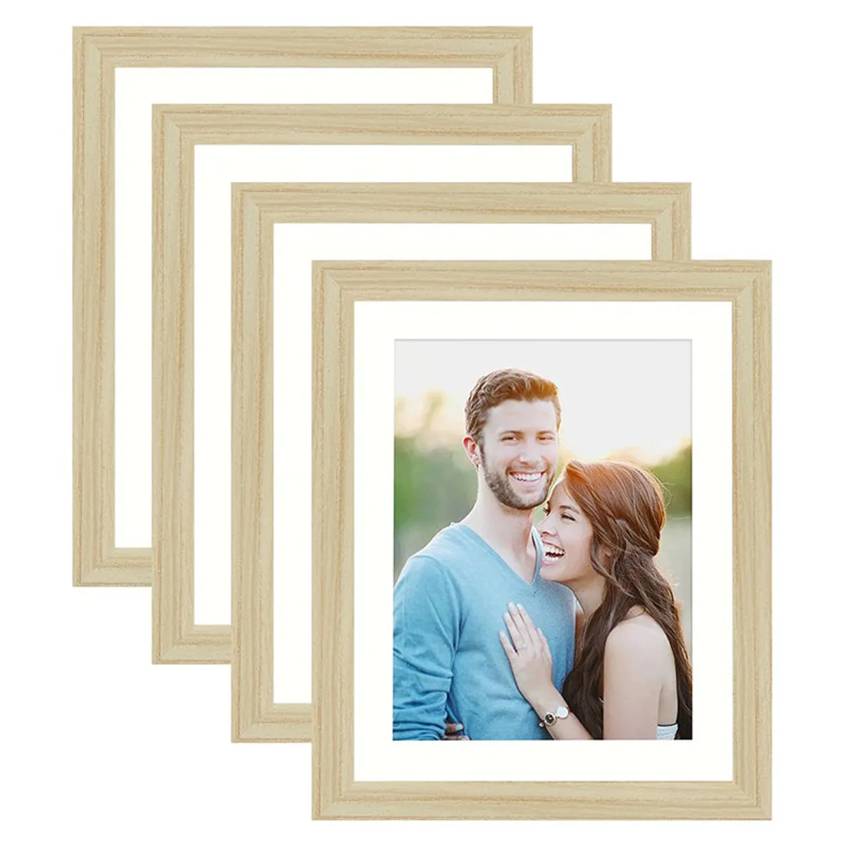 Four natural wood photo frames shown together with white mats