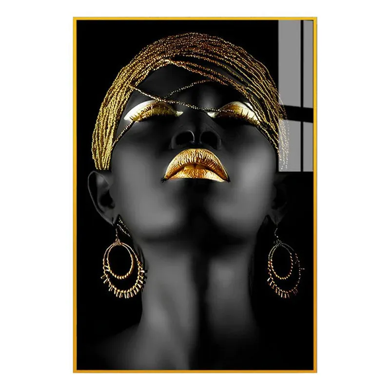 Close view of framed black and gold portrait canvas wall art