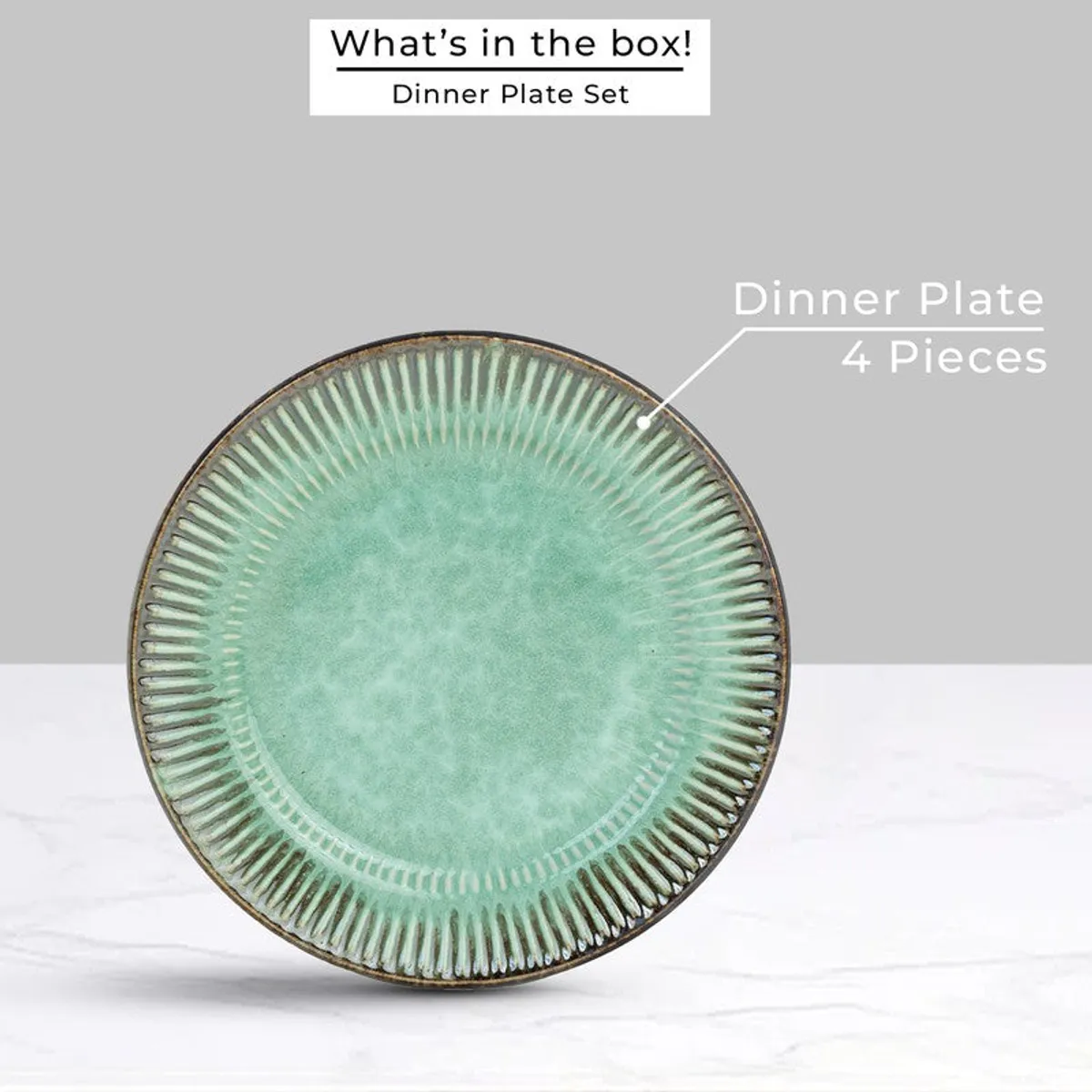 Single green textured ceramic dinner plate displayed upright.