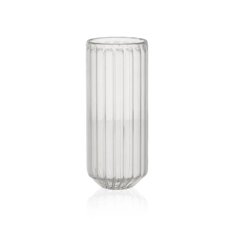 Single clear drinking glass with vertical ripple texture