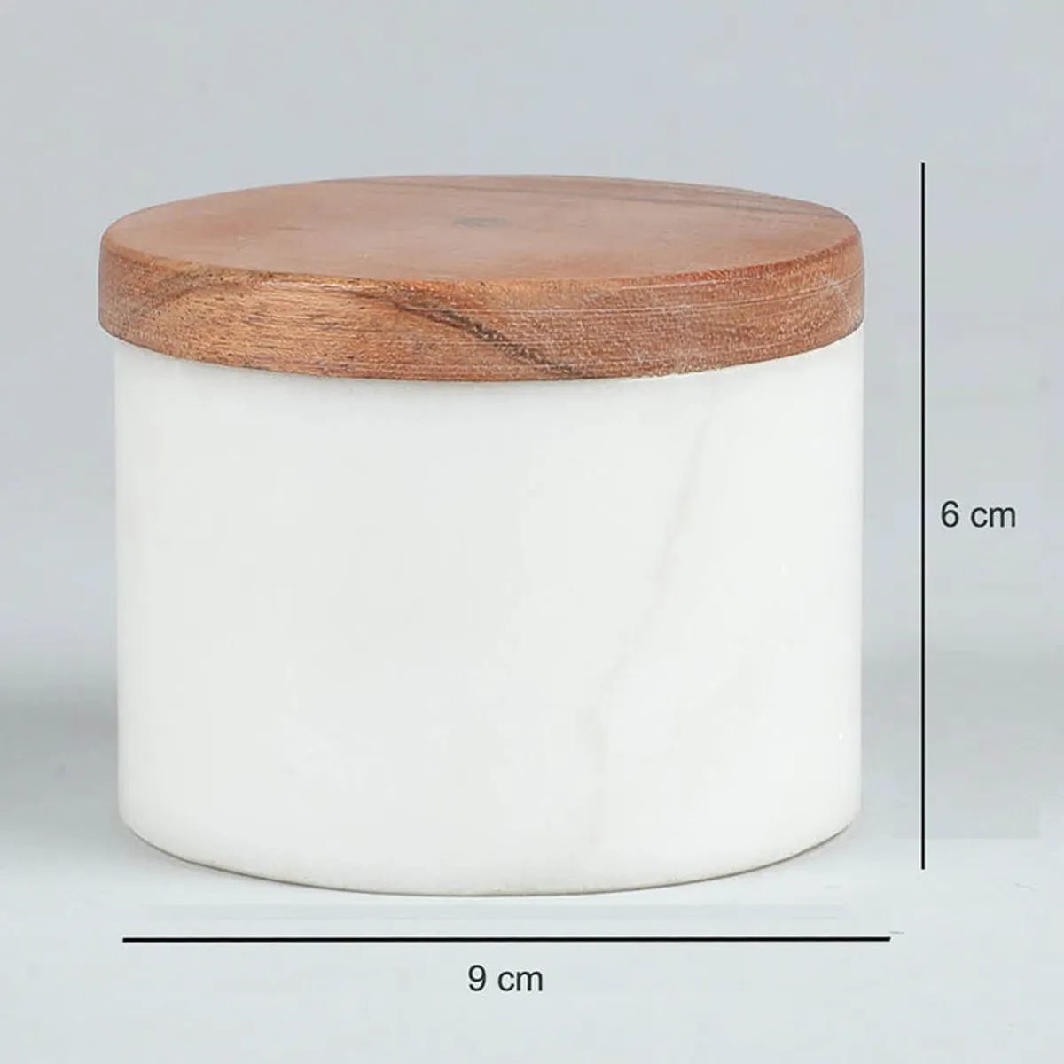 Closed white marble jar with brown wood lid and visible dimensions