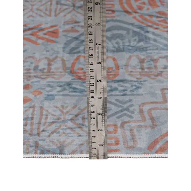 Close-up of carpet surface with ruler placed vertically