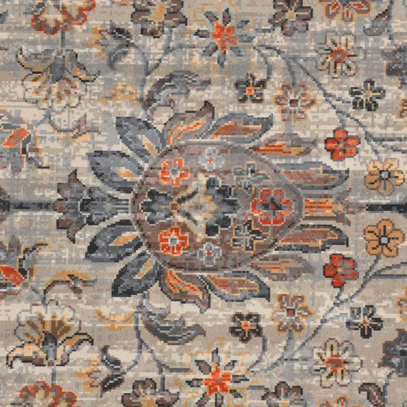 Close-up of the carpet's intricate multicolour floral and ethnic motif