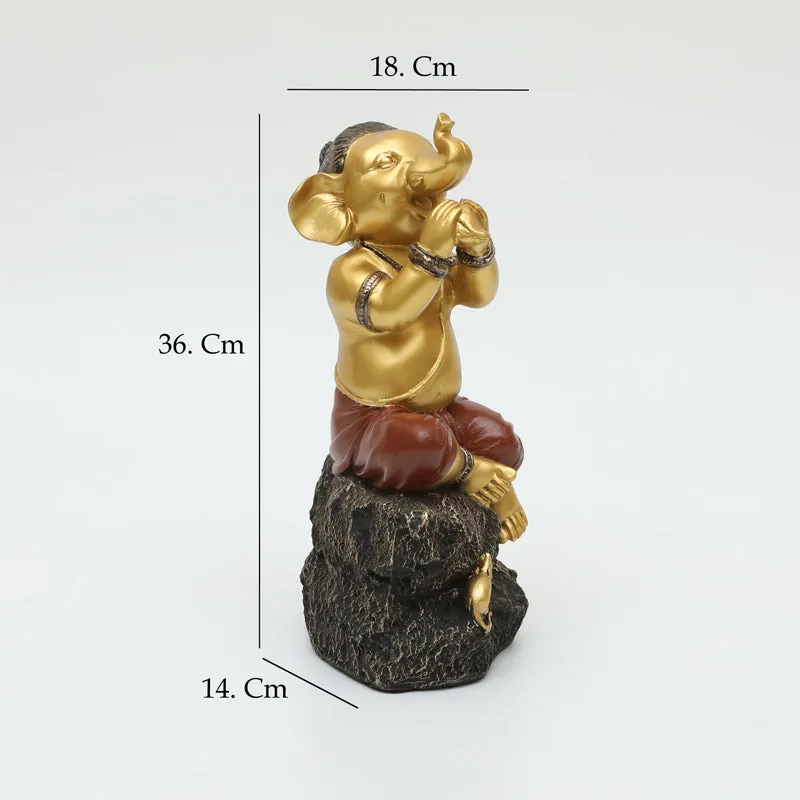 Playful Vinayaka Polyresin Showpiece - Gold & Black media 7