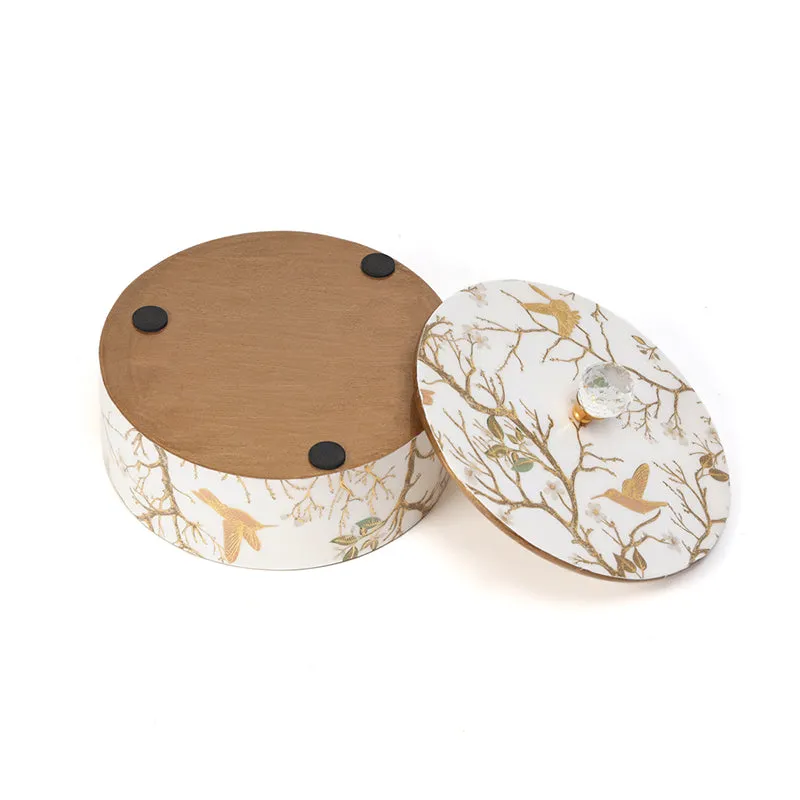 Underside of the round box and its detached decorative lid