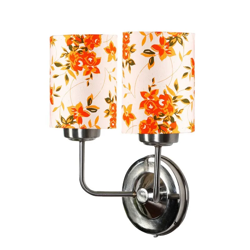 Angled view of floral cotton wall lamp with steel mount