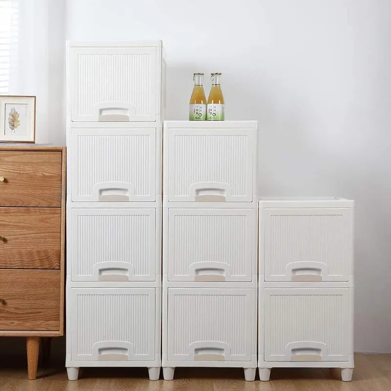 Multiple white ribbed storage organizers arranged together against a wall