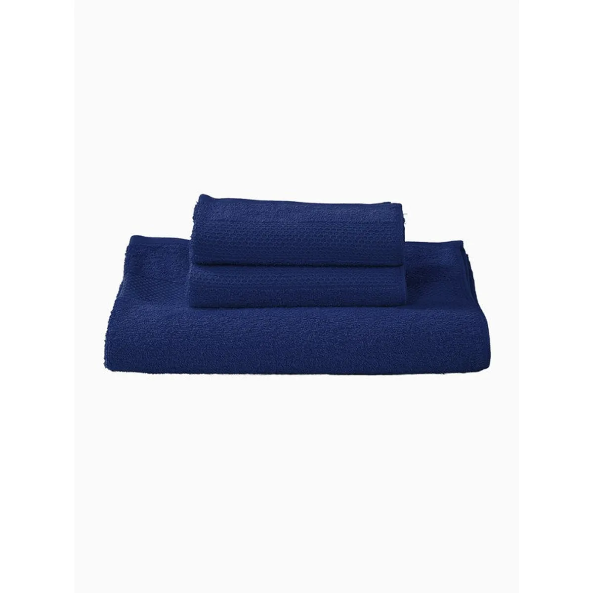 Folded navy bath towel with two hand towels on white background